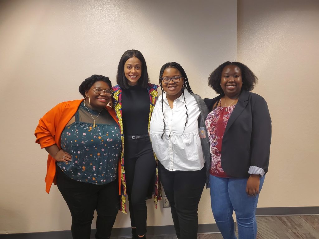 Sara Joyner poses with members of NMSU's Black Programs